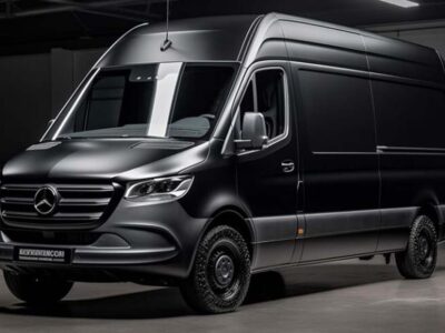 Black Mercedes-Benz cargo van in garage