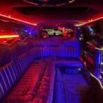 Luxury limousine interior with red and blue neon lighting