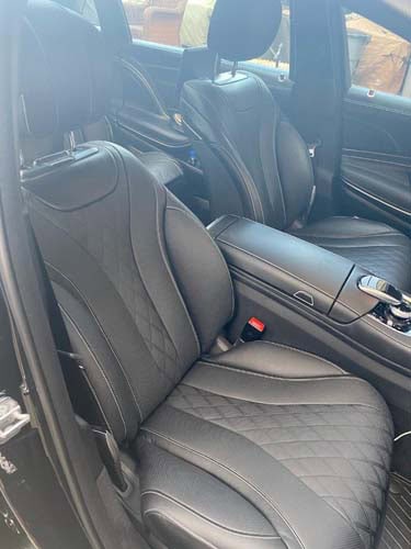 Black leather car seats with diamond stitching interior