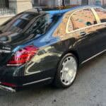 Black Mercedes-Benz S560 sedan parked on street