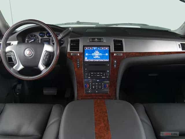 Car interior dashboard with steering wheel and console