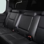 Black leather rear bench seat inside vehicle