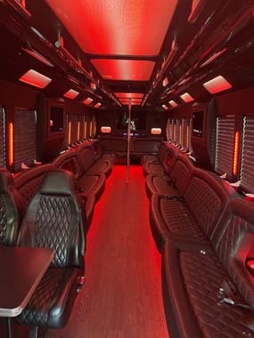 Luxury party bus interior with red LED lighting
