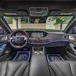 Luxury car interior with leather seats and dashboard
