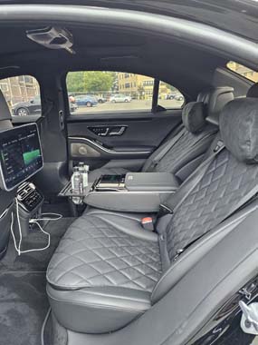 Luxury car rear seats with quilted leather interior