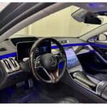 Luxury car interior with blue ambient lighting