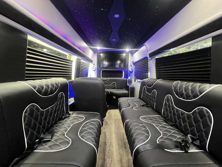 Luxury shuttle van interior with quilted leather seating