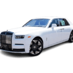 White Rolls-Royce luxury sedan on white background