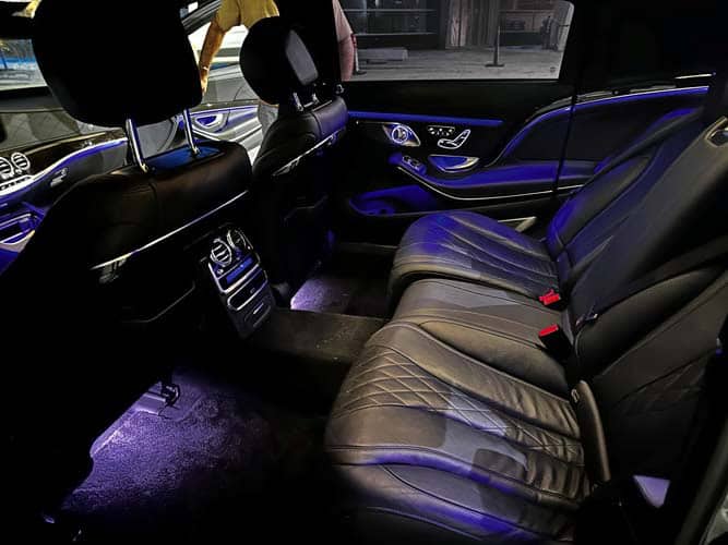 Luxury car rear seats with ambient lighting