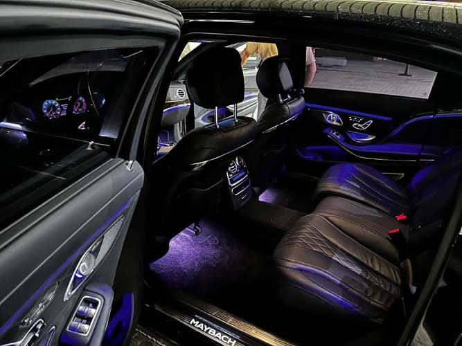 Luxury car rear seat with ambient lighting