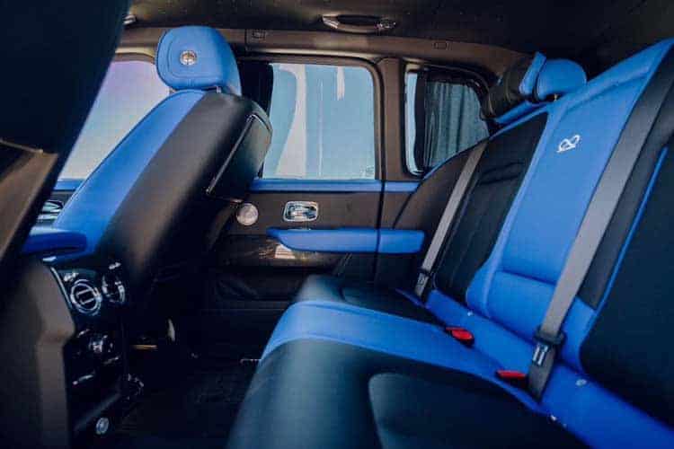 Blue and black luxury car rear seats interior