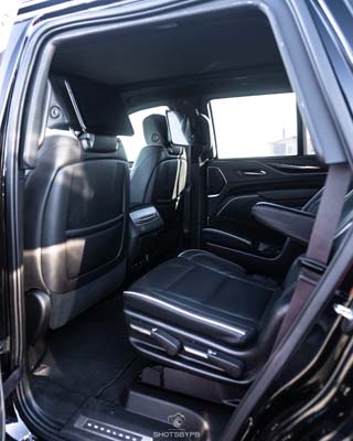 Black leather rear seats in luxury SUV interior