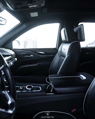 Modern car interior with leather seats and dashboard