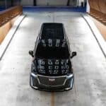 Black SUV in indoor testing facility