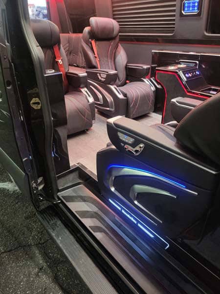 Luxury van interior with leather seats and LED lighting