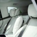 White leather car interior with front seats