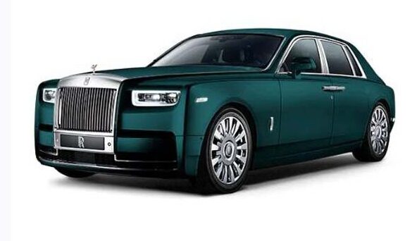 Dark green Rolls-Royce luxury sedan studio shot