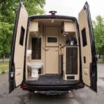 Camper van bathroom interior with toilet and shower