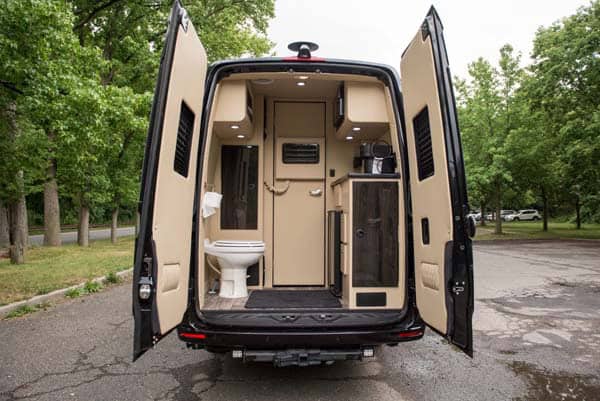Camper van bathroom interior with toilet and shower