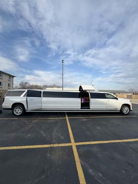 White stretch limousine parked in empty lot