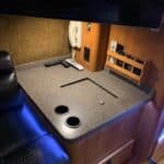 RV countertop with holes and leather seating