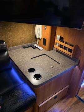 RV countertop with holes and leather seating