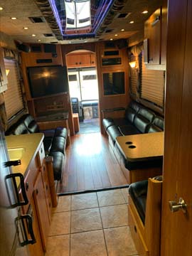 Luxury tour bus interior with leather seating