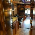 Motorhome interior with kitchen and seating area