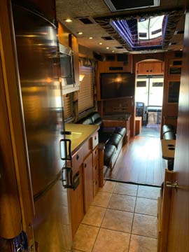 Motorhome interior with kitchen and seating area