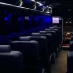 Empty bus interior with blue ambient lighting