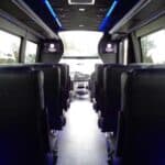 Interior of luxury shuttle bus with blue lighting