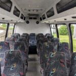 Interior of a passenger minibus with patterned seats