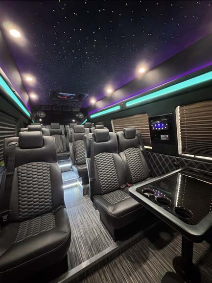 Luxury van interior with leather seats and starlit ceiling