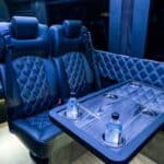 Luxury van interior with leather seats and table
