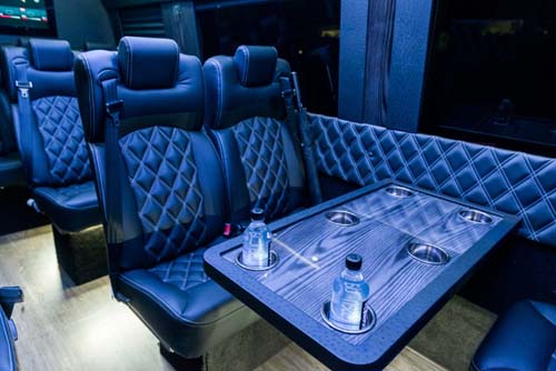 Luxury van interior with leather seats and table