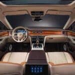 Luxury car interior with tan leather and sunroof