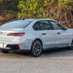Gray BMW sedan parked on roadside