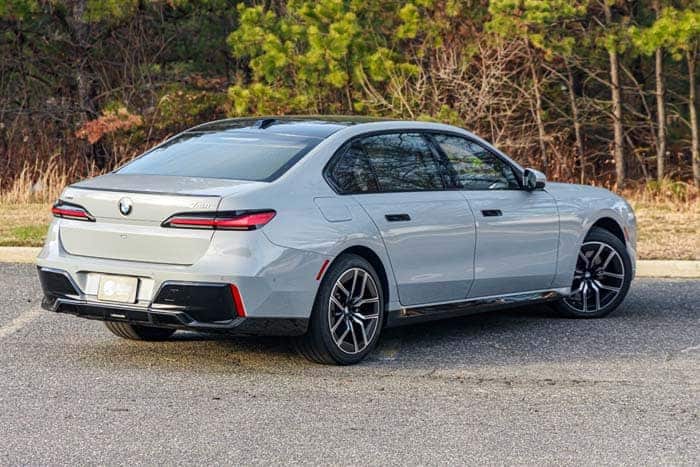Gray BMW sedan parked on roadside