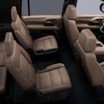 Three-row SUV interior with tan leather seats