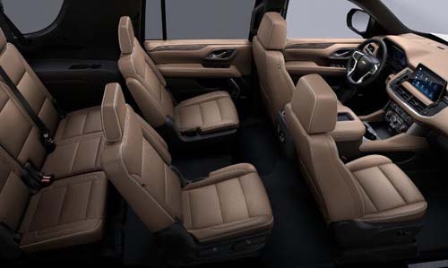 Three-row SUV interior with tan leather seats