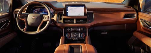 Modern car interior with touchscreen dashboard and steering wheel