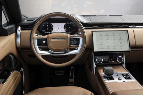Luxury car interior with touchscreen dashboard and steering wheel