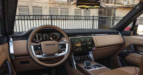 Luxury car interior with steering wheel and dashboard display