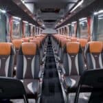 Interior of modern coach bus with empty seats