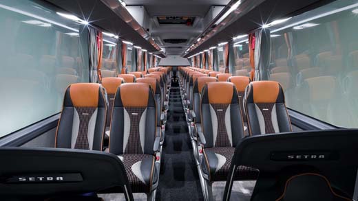 Interior of modern coach bus with empty seats