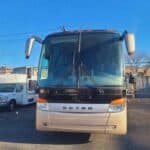Front view of Setra coach bus in parking lot