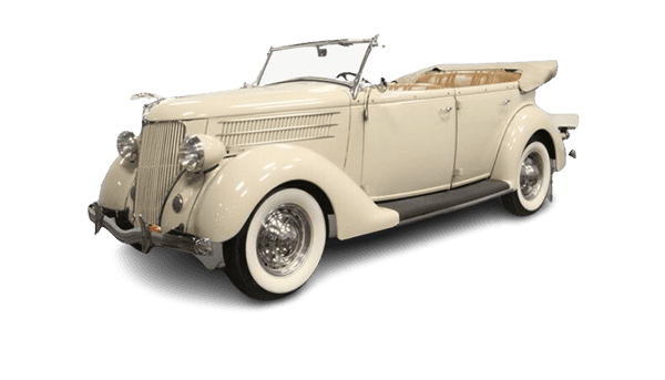 Vintage cream-colored convertible car with whitewall tires