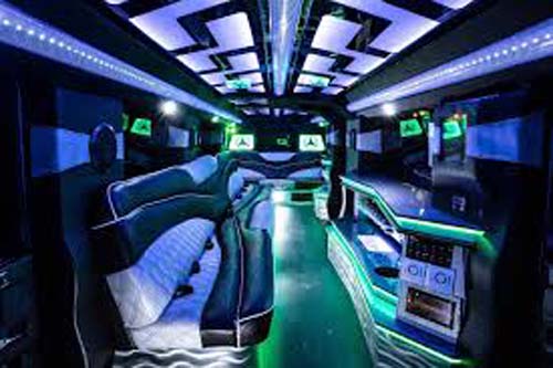 Luxury limousine interior with neon lighting and leather seats