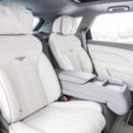 Luxury car interior with white leather seats