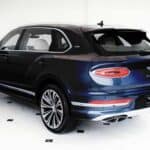 Dark blue Bentley Bentayga SUV rear view